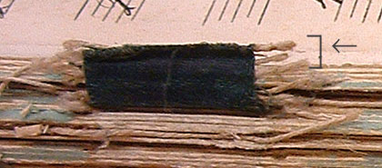 Colour image showing Symphony No. 1, ACF1, volume 2, upper tape and severed threads (bracketed)
